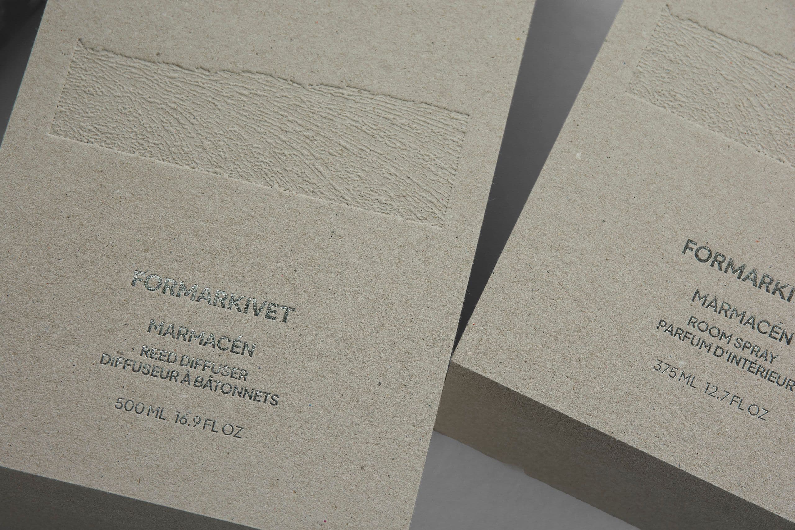 Exclusive rigid boxes for home scent products, with metallic foil and embossing.