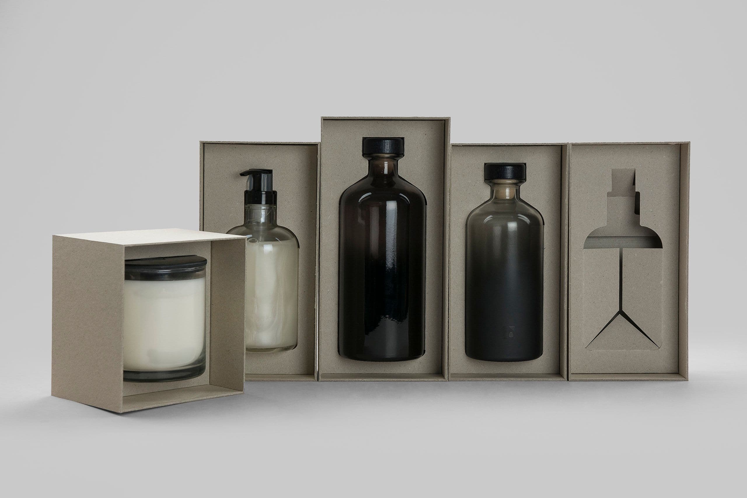 Exclusive rigid boxes for home scent products, with metallic foil and embossing.