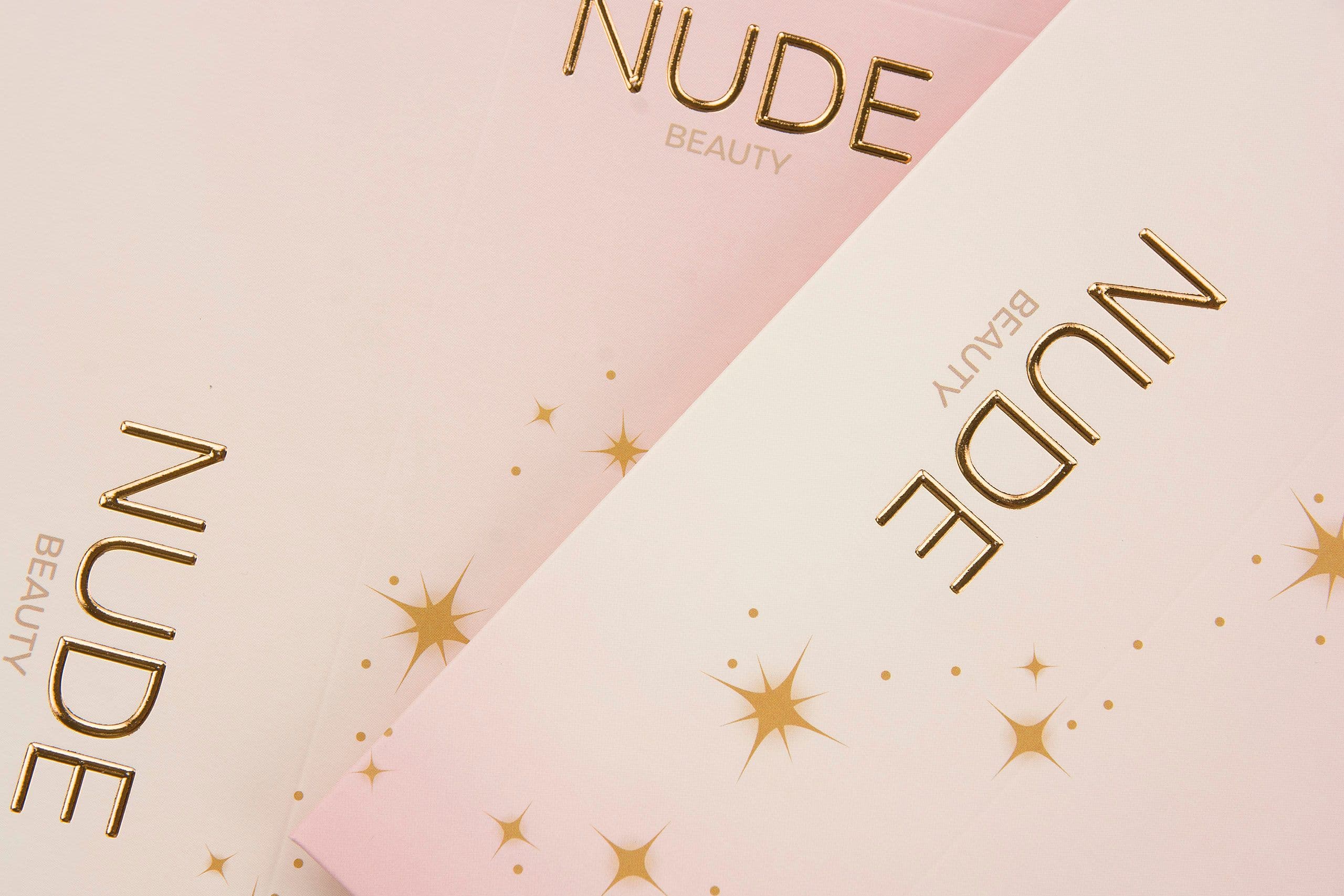 Foil stamping in gold on a printed folding box