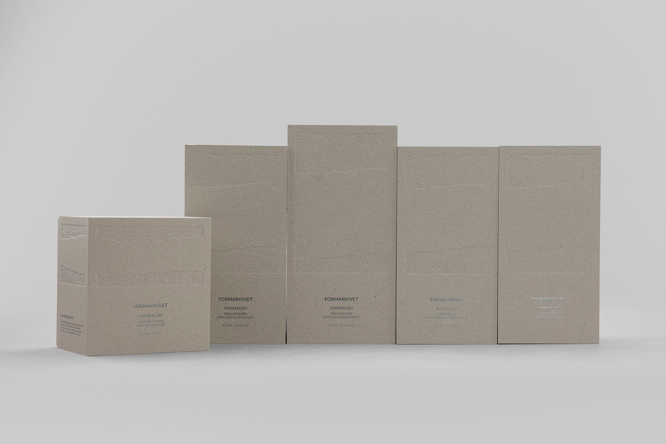 Exclusive rigid boxes for home scent products, with metallic foil and embossing.