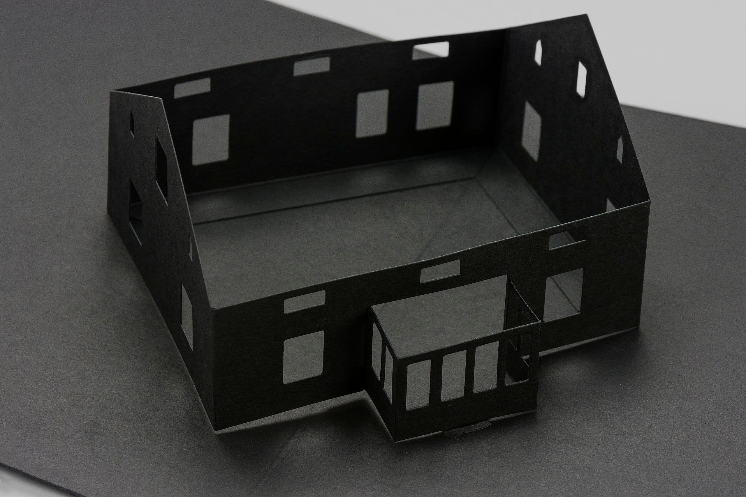 Exhibition catalogue in a black rigid box