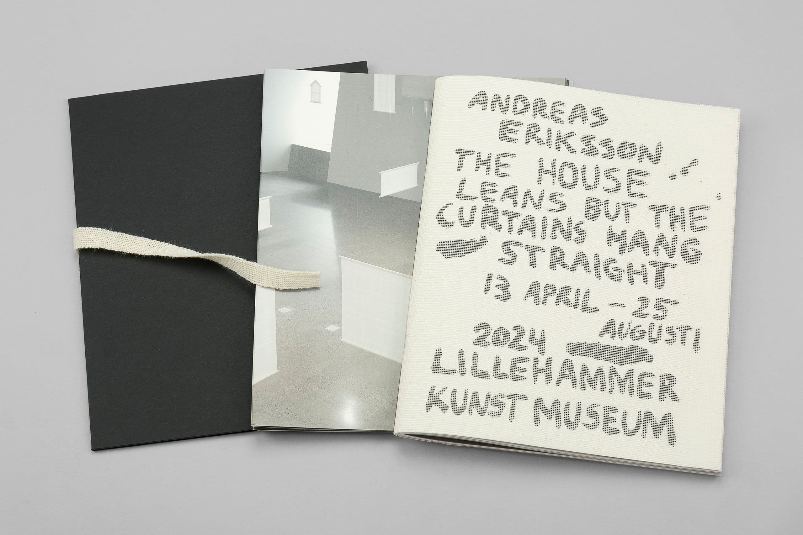 Exhibition catalogue in a black rigid box