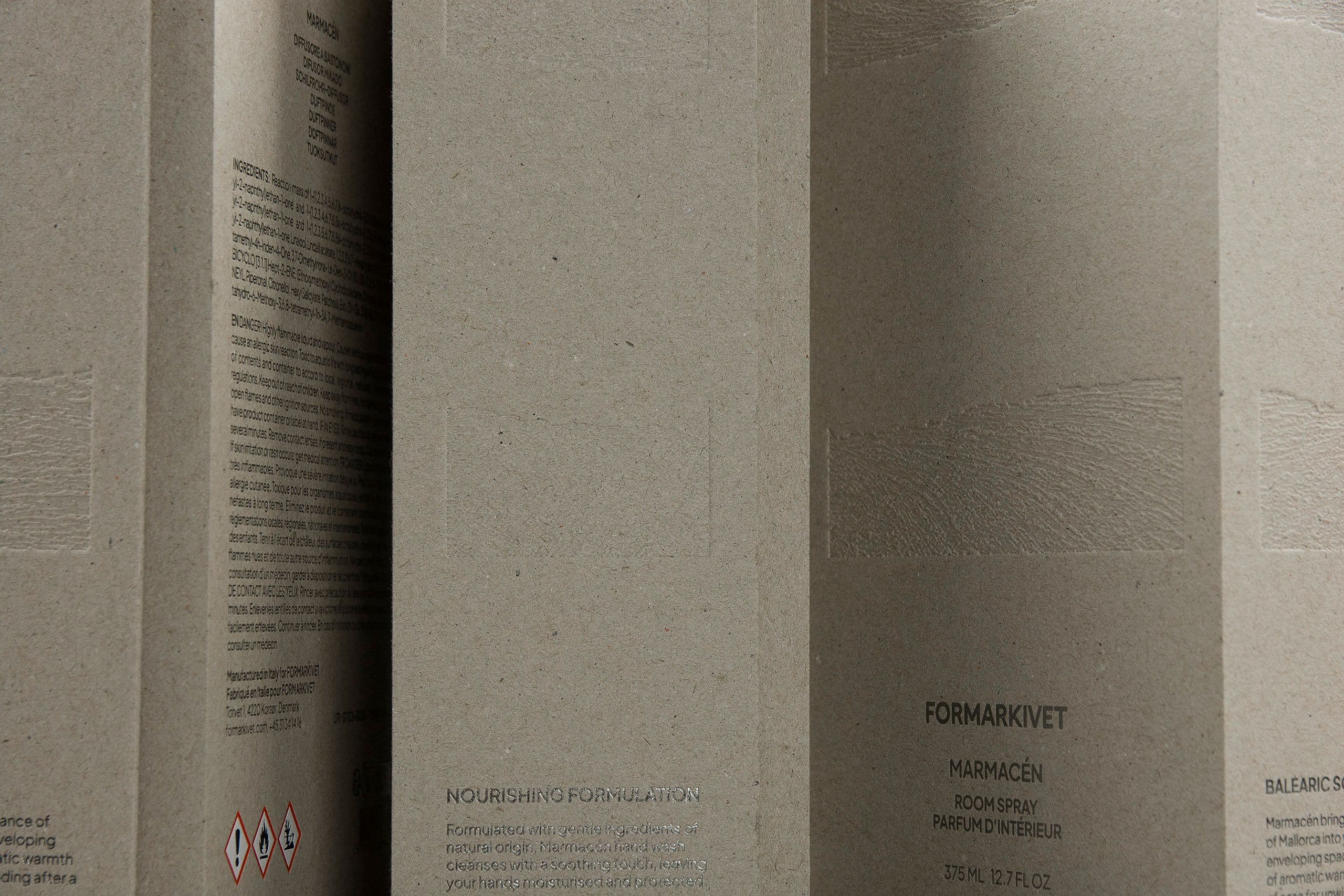 Exclusive rigid boxes for home scent products, with metallic foil and embossing.