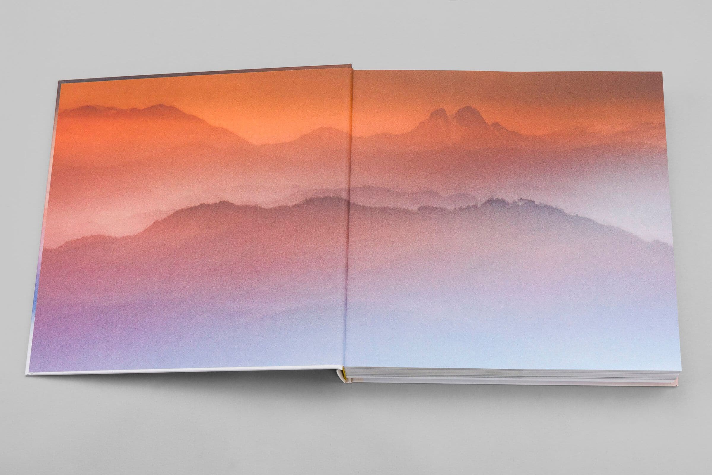 Hard cover book with printed cloth, foil stamping on front and spine