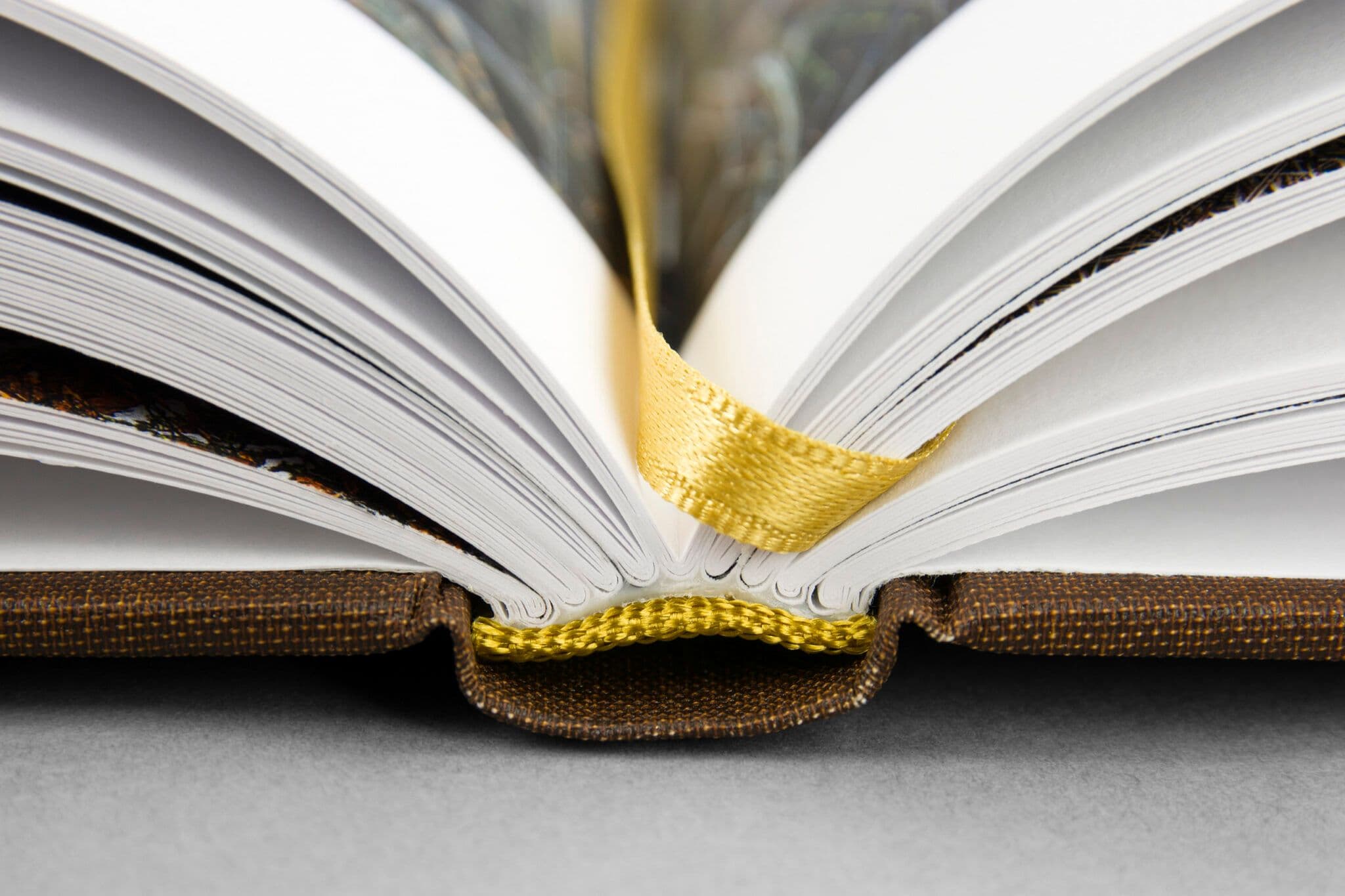 Hardcover book with head and tail band in gold