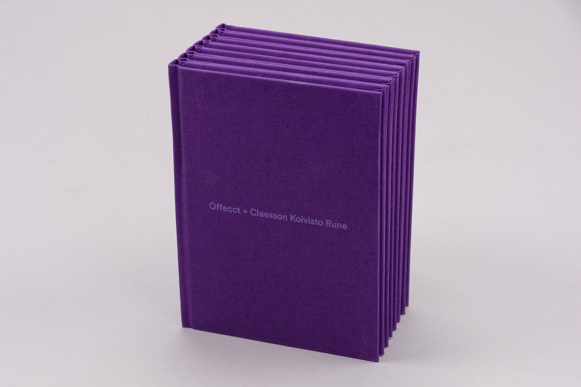 Thread sewn hardcover book with purple cloth