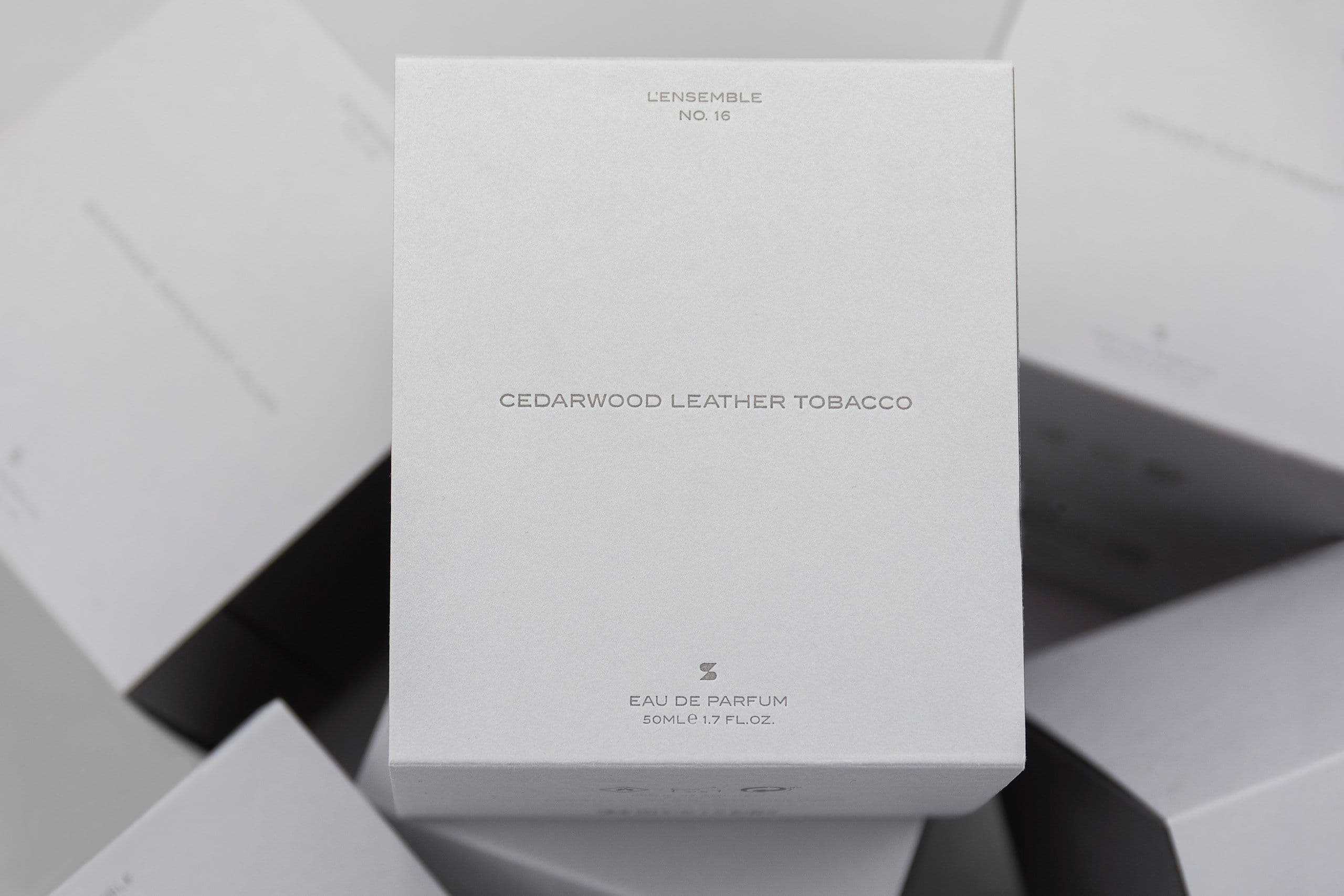 Exclusive rigid boxes for perfumes with a foil stamped sleeve.